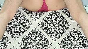 Milf teases in red lingerie with natural tits