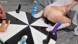 petite stepsister earns her orgasm with wheel of dildos game