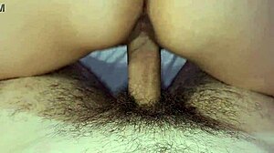 I'm fucking my wife in missionary position, her small tits bouncing close-up