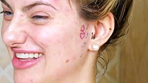 Gorgeous blonde takes a shower on sofa after photoshoot