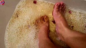Washing feet with rose petals and herbs after a hard day!