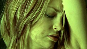 chained up woman masturbating in bdsm costume