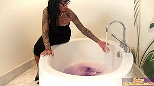 Bodybuilder dominated by German MILF with strap-on in fetish scene