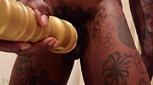 Hallelujah Johnson uses gold fleshlight in bdsm