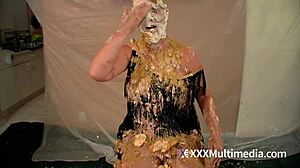 Two blondes get wet and messy while smoking and masturbating, ending with a pie in the face