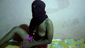 sexy latina amateur arches in doggy style, revealing huge natural tits and small body.