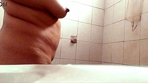 Oh man, I can't believe this voyeur adventure with the busty gordibuena taking a shower to show off... wait, exhibirse? Yeah, that's it.