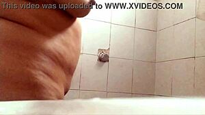 Oh man, I can't believe this voyeur adventure with the busty gordibuena taking a shower to show off... wait, exhibirse? Yeah, that's it.