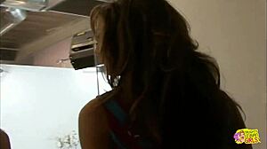 Two lesbian babes, a brunette and blonde, lick each other's cunts then use a dildo for sex.