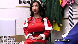 Big tit milf in fishnet bodysuit at office desk.