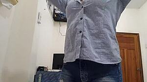 Excited secretary touches herself in boss's office waiting for clients