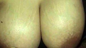 Wife gives intense handjob to big tits