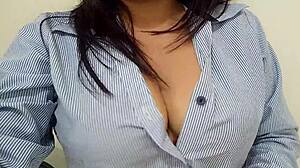 Excited secretary touches herself in boss's office waiting for clients