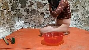 oh man this shemale is peeing in ass with cucumber stretching gaping fruit play and small 18+ cock!!