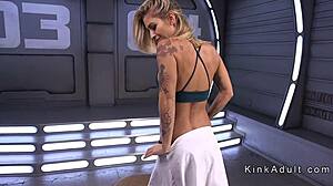 Tattooed busty blonde enjoys machine fucking