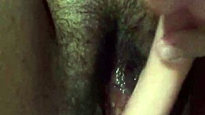 Teen virgin rubs with dildo