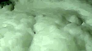 Cyno enjoys a suggestive bubble bath in cosplay costume