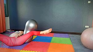 Nude yoga regina noir a woman in yoga leotards practices yoga in the gym c1