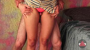 Lifting Her Skirt To Reveal Thighs In A Playful Moment