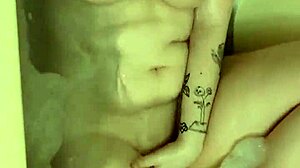 this tomboy does a striptease and has orgasms in the bathtub