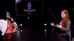 Redhead beauty interviewed by presenter Bia Hot, then poses on sheer red - Natasha Fiore