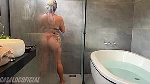 Wife in bedroom gets submissive with bisexual kiss.