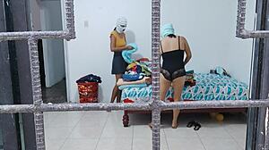 Horny housewives touch buttocks and tits while doing housework.