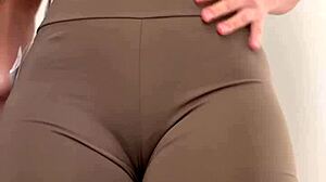 Beautiful Brazilian wife tries on clothes in the dressing room