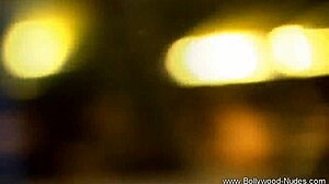 Brunette babe from wild india teases softly with erotic undressing and striptease in a captivating dance routine.