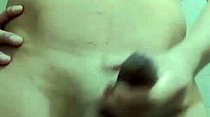 Skinny guy with big cock and small waist masturbates solo in work bathroom