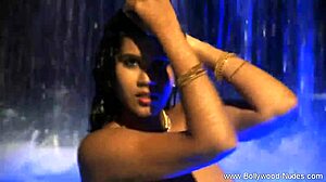 Brunette babe from wild india teases softly with erotic undressing and striptease in a captivating dance routine.