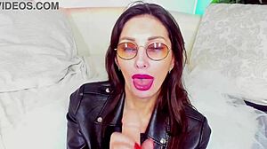 I'm a hot milf giving a blowjob while wearing glasses