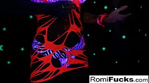 romi plays with a disco ball before stuffing and toying her pussy