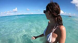 during a casual beach stroll this couple shares tender passion with creamy kisses and intimate touches