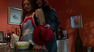 I watch a redheaded lesbian babe force another big breasted lady to eat cakes and fruit