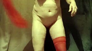 Watch as a French housewife teases with a striptease, hinting at bondage and maledom in outdoor public play