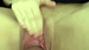 I'm flashing my pussy at the window and stretching it with this fat dildo