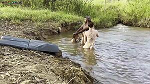 Outdoor Sunbathing Sex by River with Two Hot Babes Sucking and Creampie