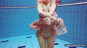 Martina the hot croatian continues her hot show... uh with bikini and underwater nudist vibes in pool and beach settings.