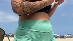 The young guy hadn't even fucked her swollen pussy yet when he suggested bringing a friend to join them on the beach for more.