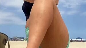 The young guy hadn't even fucked her swollen pussy yet when he suggested bringing a friend to join them on the beach for more.