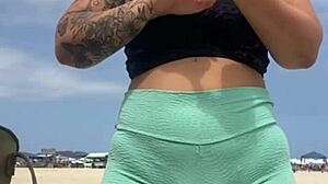 The young guy hadn't even fucked her swollen pussy yet when he suggested bringing a friend to join them on the beach for more.