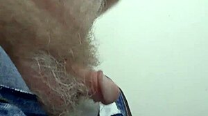 Rustyas1 masturbates solo in public toilet.