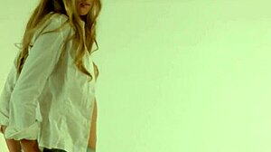 Hey check out this gorgeous blonde Ksenya B stripping her clothes for a wild wet solo party.