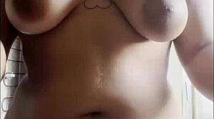 taking coffee naked with big breasts chatting to the camera