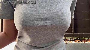 Horny Italian milf with big tits and nipples smokes outdoors in fetish close-up