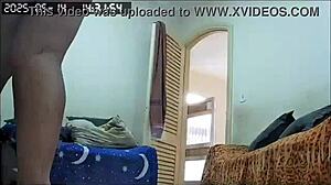 Hidden camera catches busty Brazilian BBW maid cleaning house naked, showing huge tits and ass