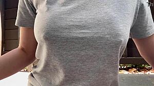 Horny Italian milf with big tits and nipples smokes outdoors in fetish close-up