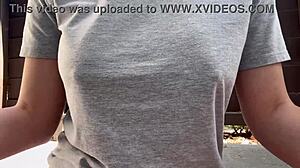 Horny Italian milf with big tits and nipples smokes outdoors in fetish close-up