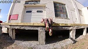 She struts in thong bodysuit along the docks, flashing her big ass outdoors